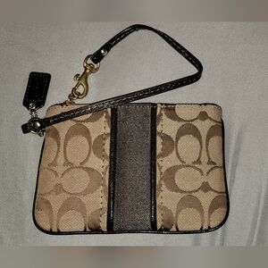 Brown Coach signature wristlet